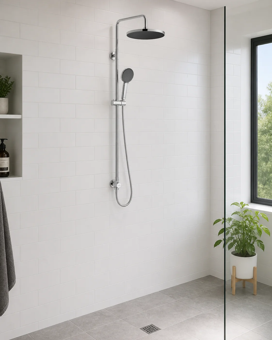 Chrome Dana column in a white tiled apartment bathroom