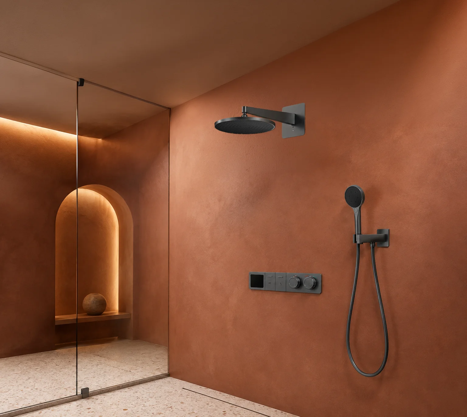Gun grey Noor system in a rust microcement shower with an arched niche